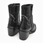 Santiag pour femme en cuir noir de la collection REBELLES chez ARIMA, vue de trois quarts arrière