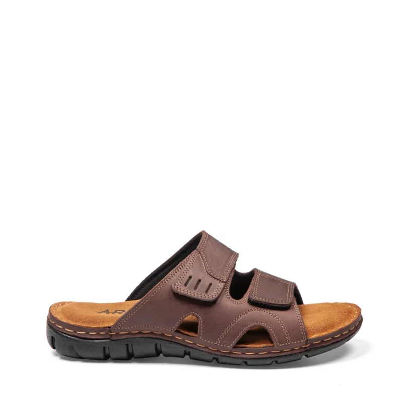 Mules à double brides confortables pour homme en cuir couleur marron. Vue de profil
